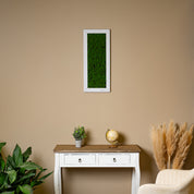 künsliches Moosbild in weißen Holzrahmen